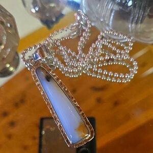 Agate Pendant In Hammered Silver.